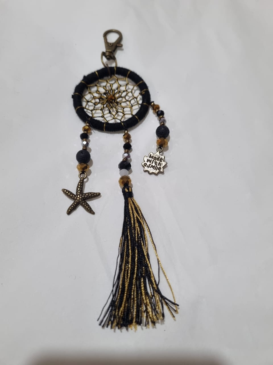 Handcrafted crystal dreamcatcher keychain with colorful tassels and beads