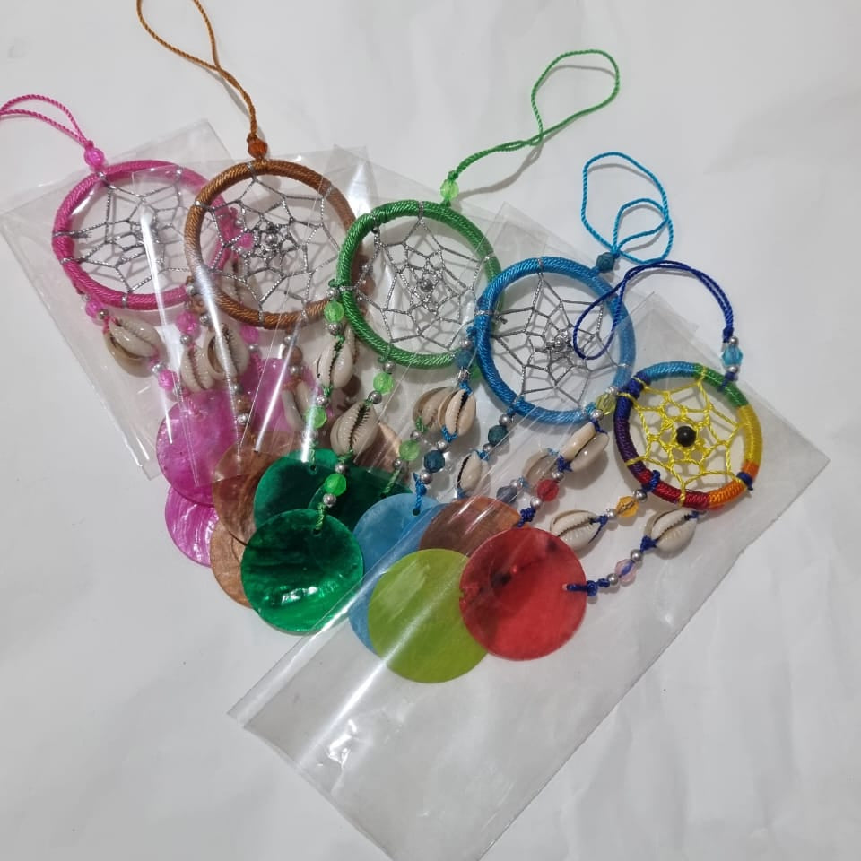 Colorful mini dreamcatcher keychain with natural shells and nylon webbing — perfect for car or wall hanging