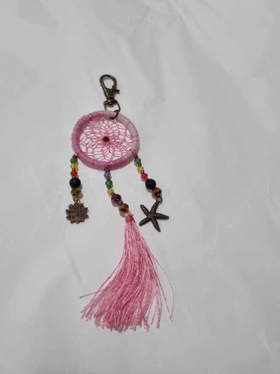 Handcrafted crystal dreamcatcher keychain with colorful tassels and beads