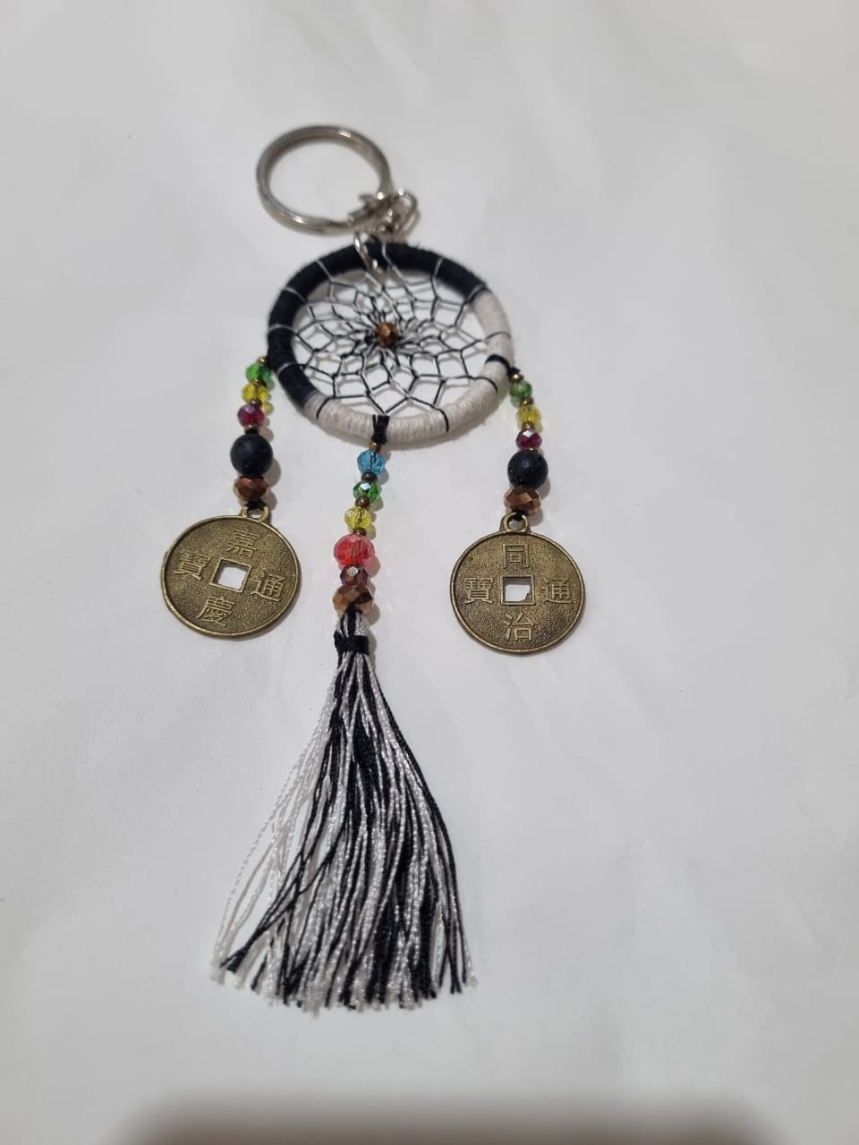 Handcrafted crystal dreamcatcher keychain with colorful tassels and beads