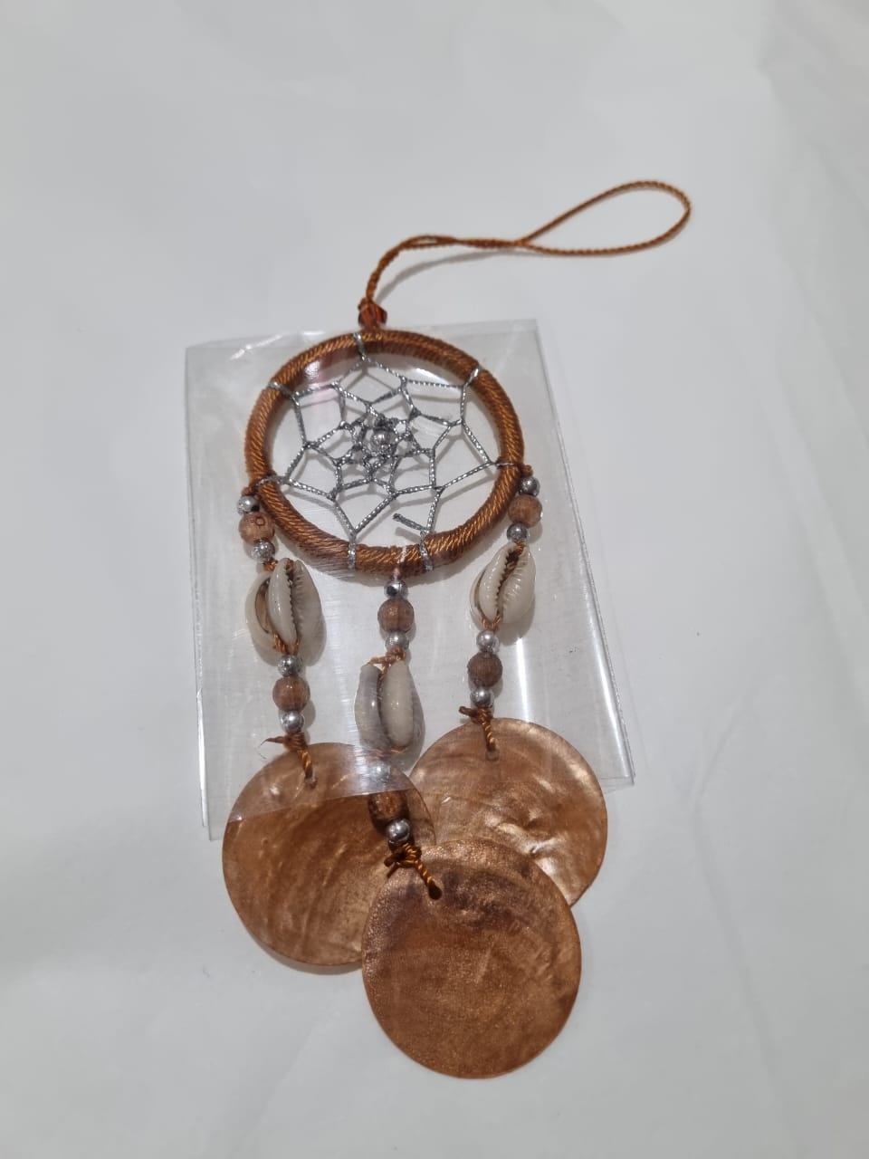 Colorful mini dreamcatcher keychain with natural shells and nylon webbing — perfect for car or wall hanging