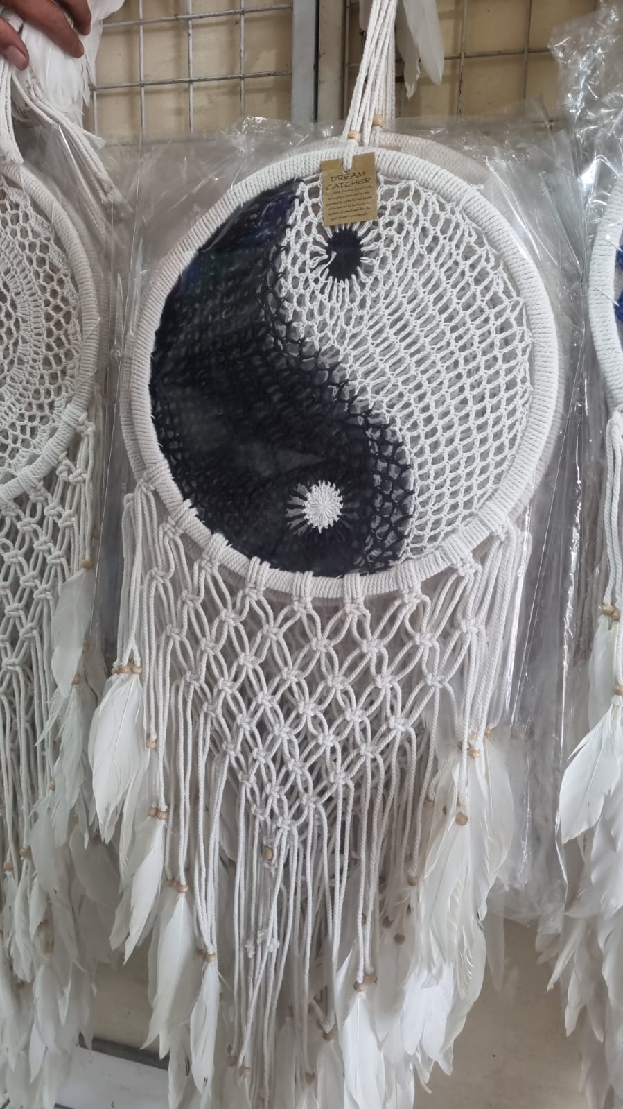 32cm handmade macrame dreamcatcher with cotton crochet center and long feather fringe – bohemian wall decor for modern spaces