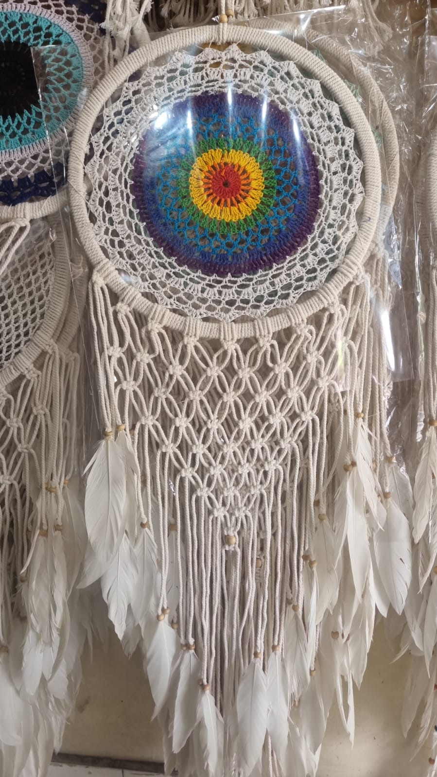 32cm handmade macrame dreamcatcher with cotton crochet center and long feather fringe – bohemian wall decor for modern spaces