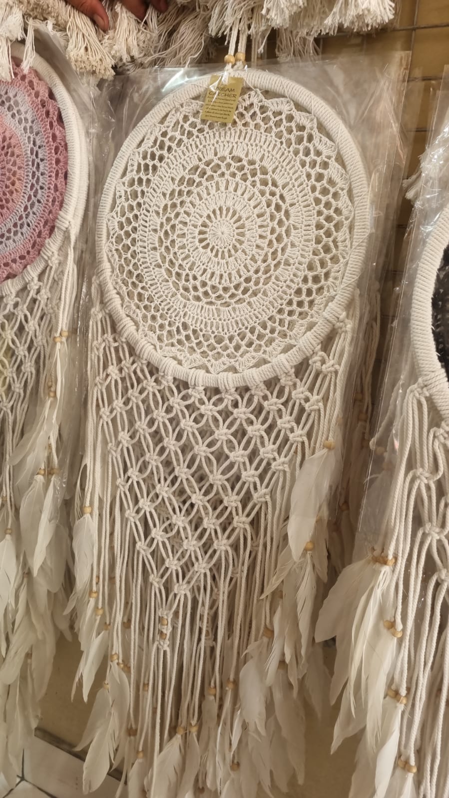 32cm handmade macrame dreamcatcher with cotton crochet center and long feather fringe – bohemian wall decor for modern spaces