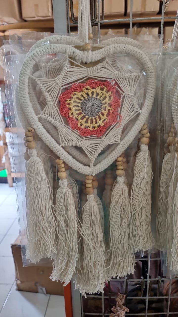 Macrame heart-shaped dreamcatcher with soft cotton tassels, wooden beads, and colorful crochet center