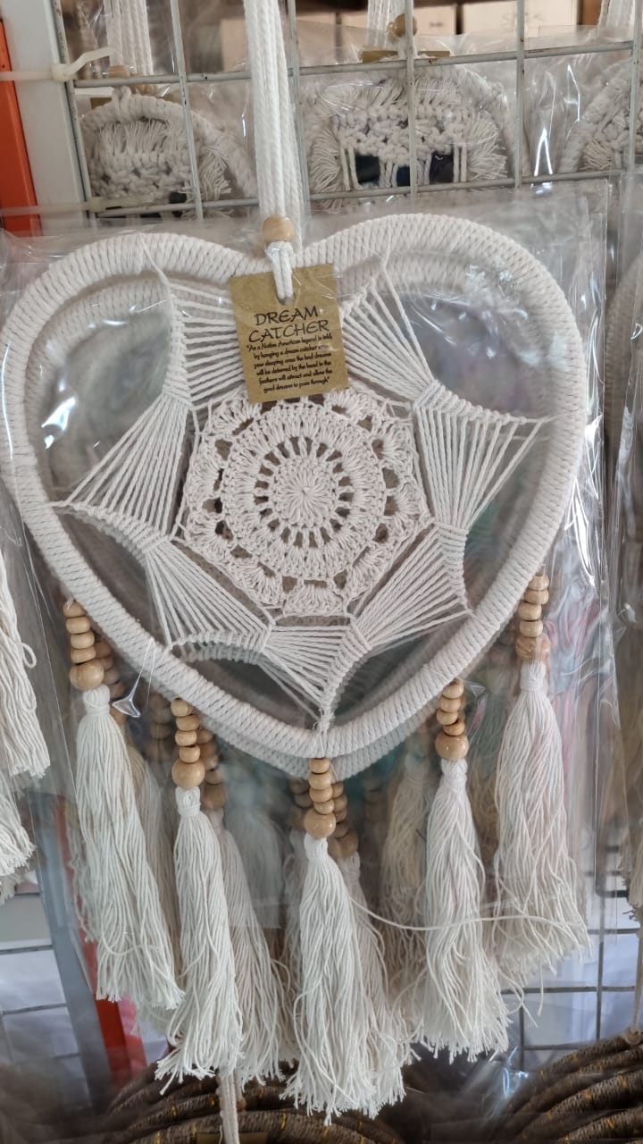 Macrame heart-shaped dreamcatcher with soft cotton tassels, wooden beads, and colorful crochet center