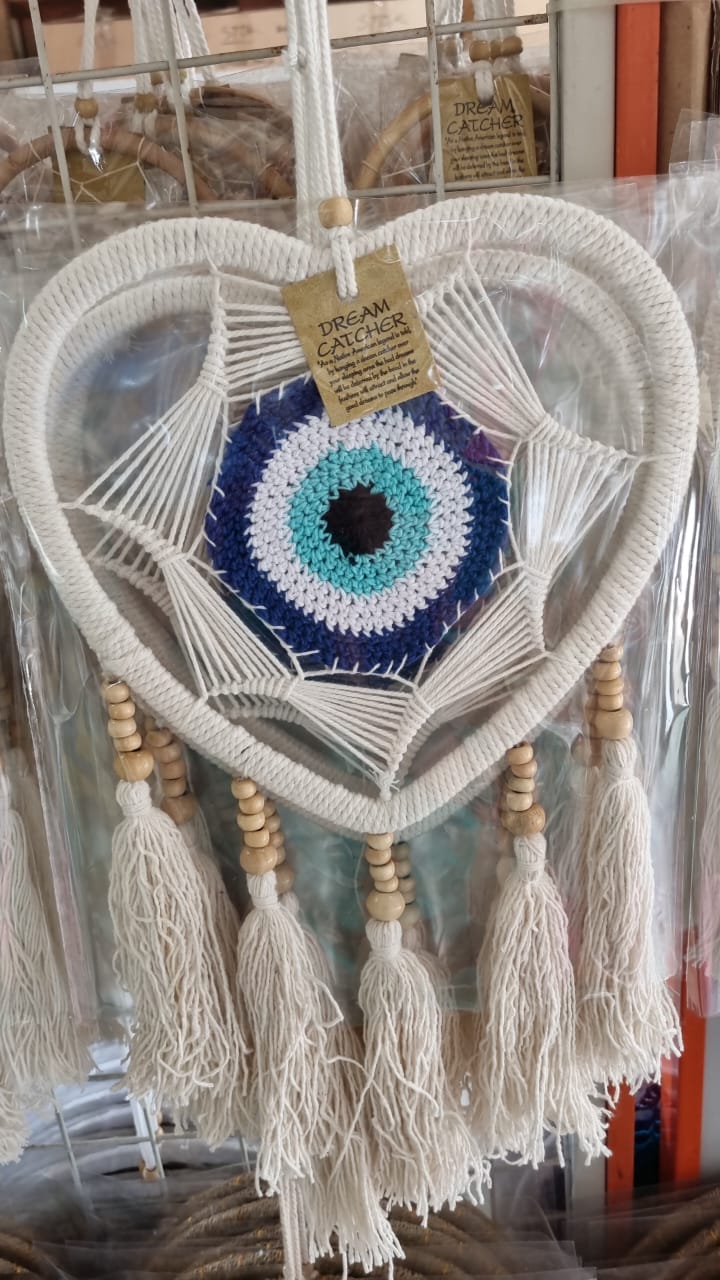 Macrame heart-shaped dreamcatcher with soft cotton tassels, wooden beads, and colorful crochet center