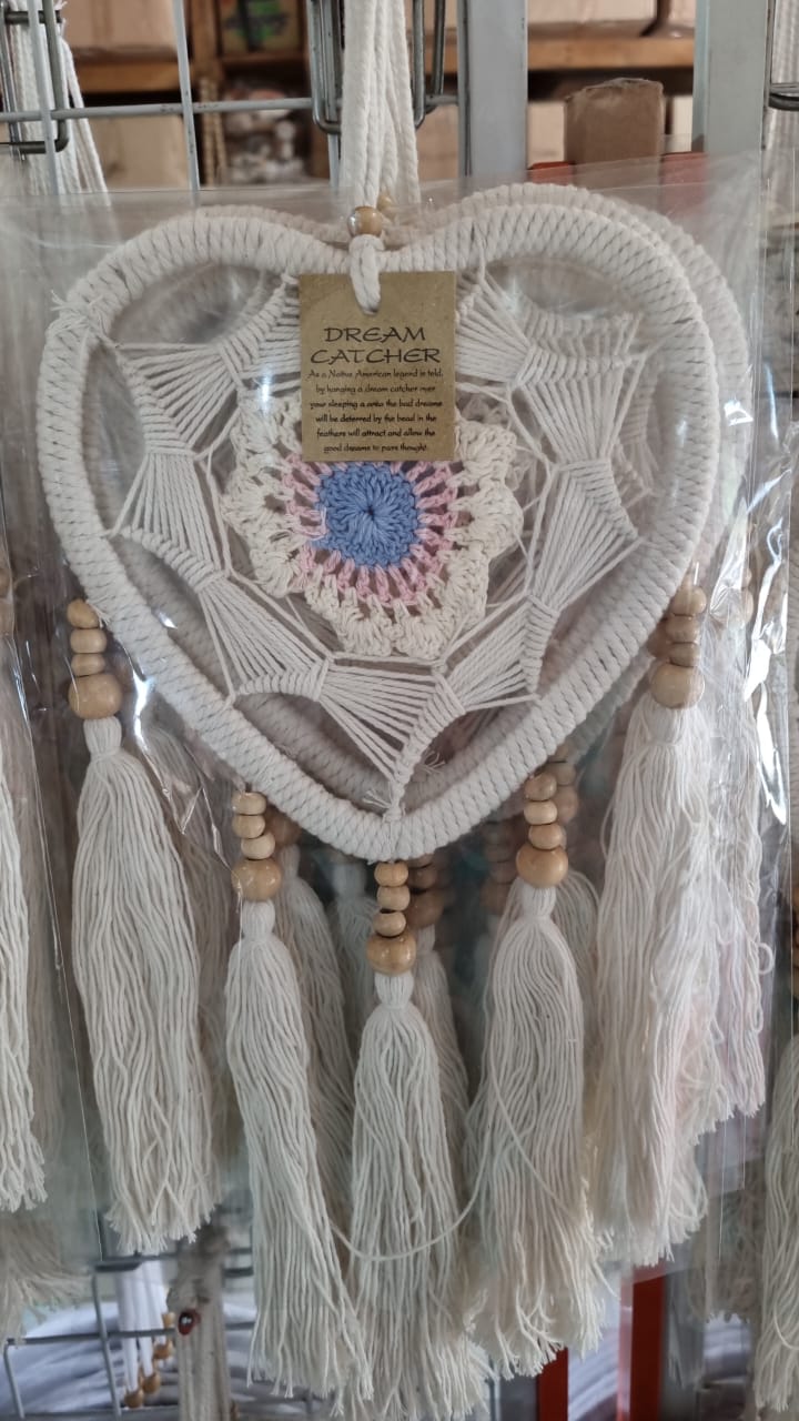 Macrame heart-shaped dreamcatcher with soft cotton tassels, wooden beads, and colorful crochet center