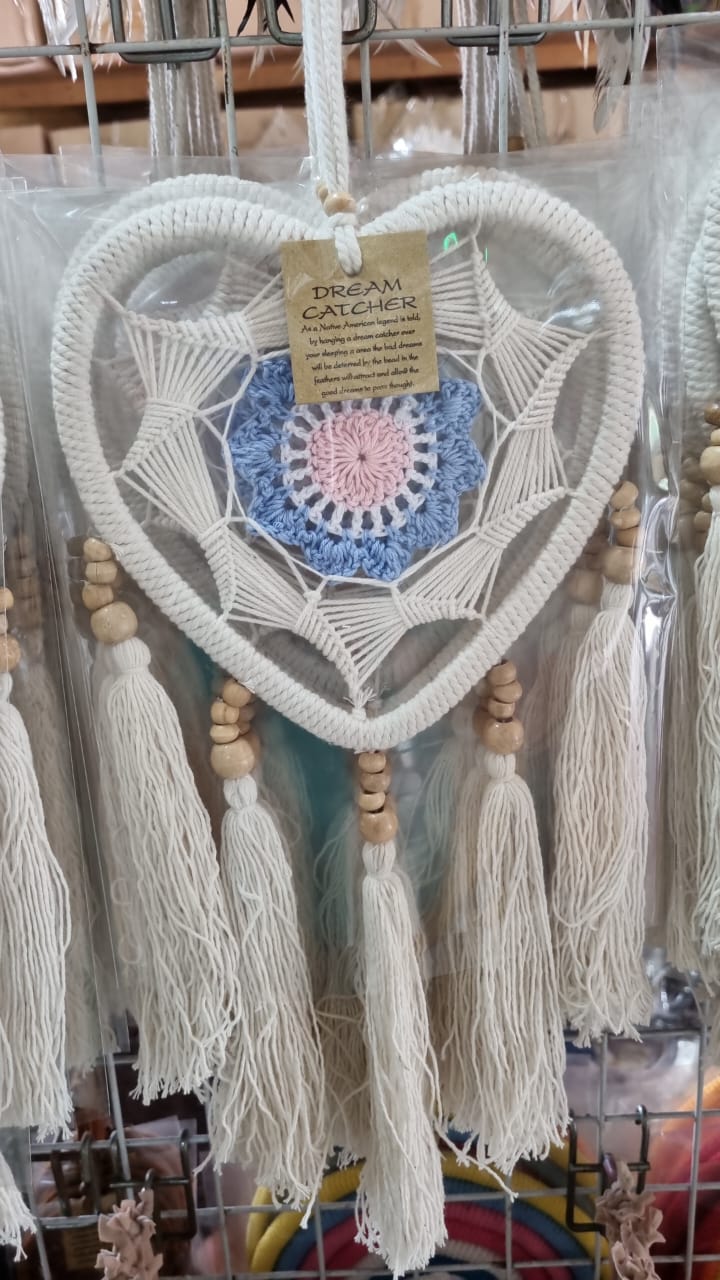 Macrame heart-shaped dreamcatcher with soft cotton tassels, wooden beads, and colorful crochet center