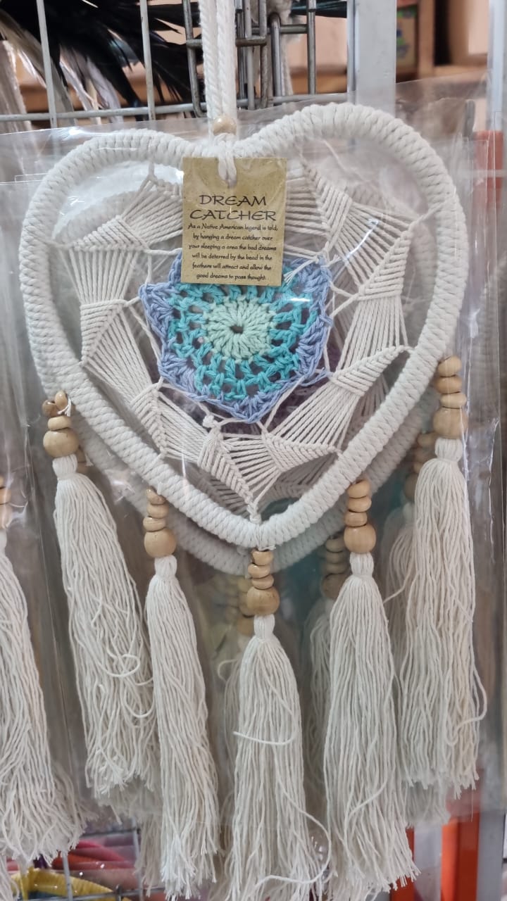 Macrame heart-shaped dreamcatcher with soft cotton tassels, wooden beads, and colorful crochet center