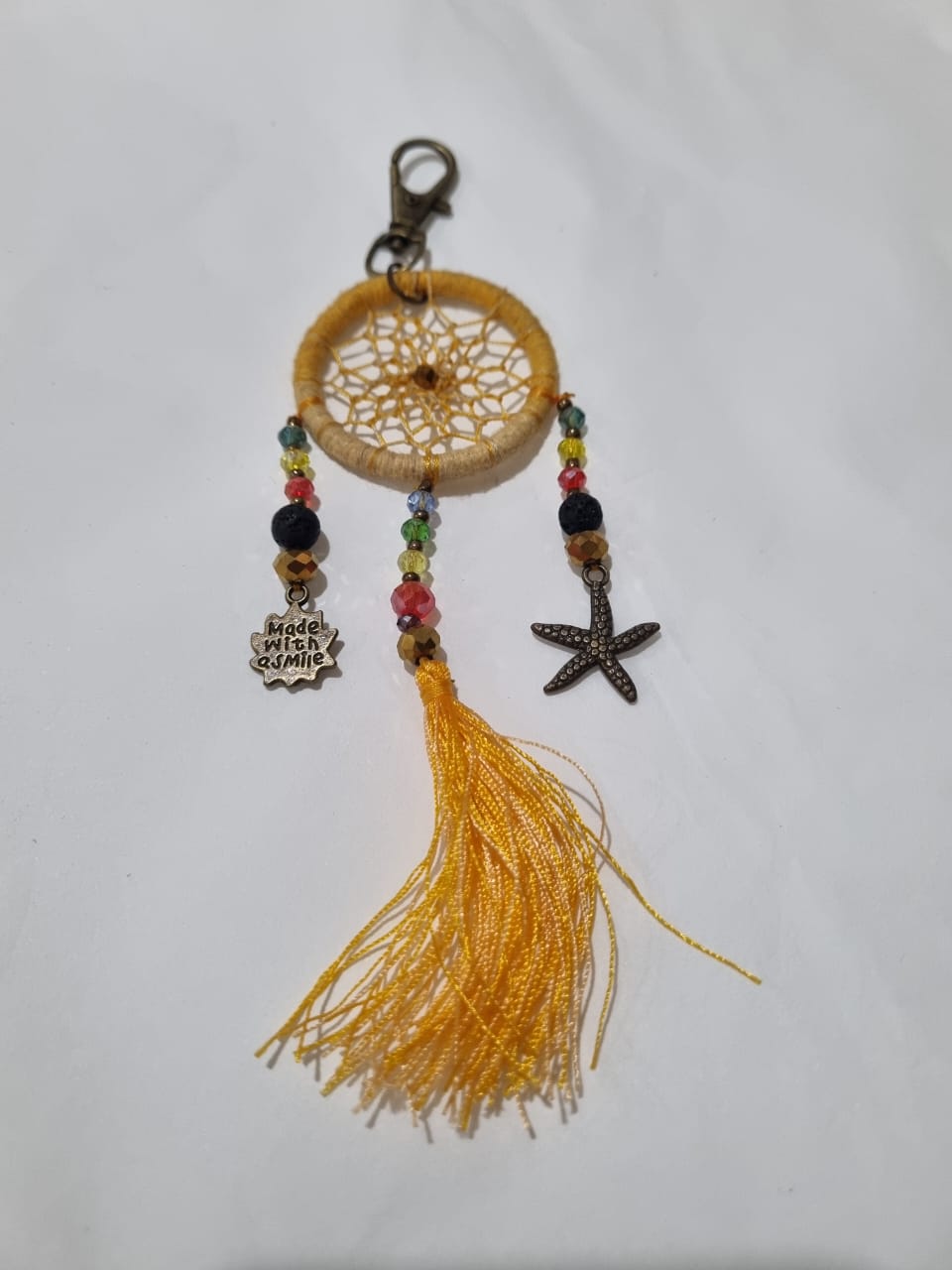 Handcrafted crystal dreamcatcher keychain with colorful tassels and beads