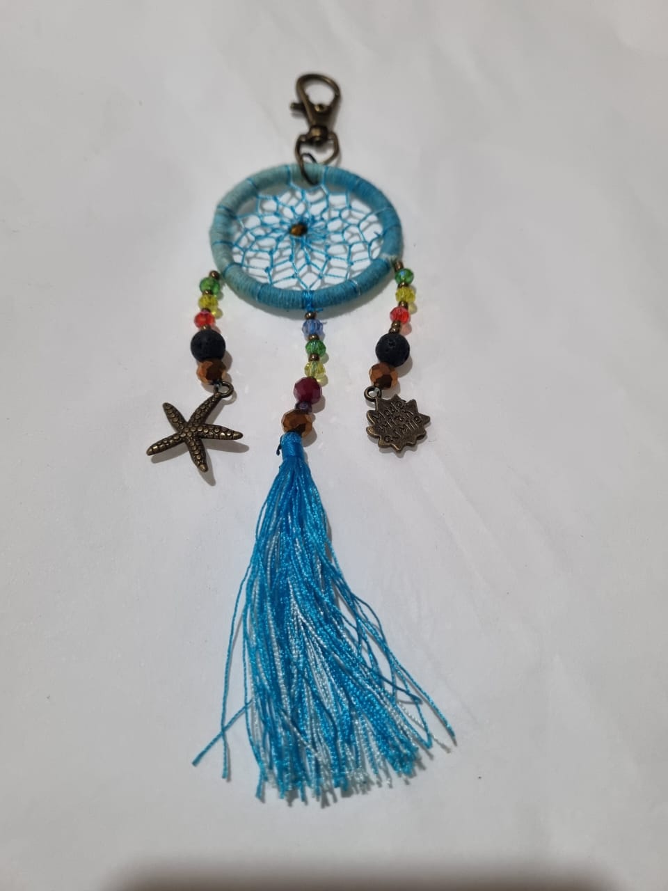 Handcrafted crystal dreamcatcher keychain with colorful tassels and beads
