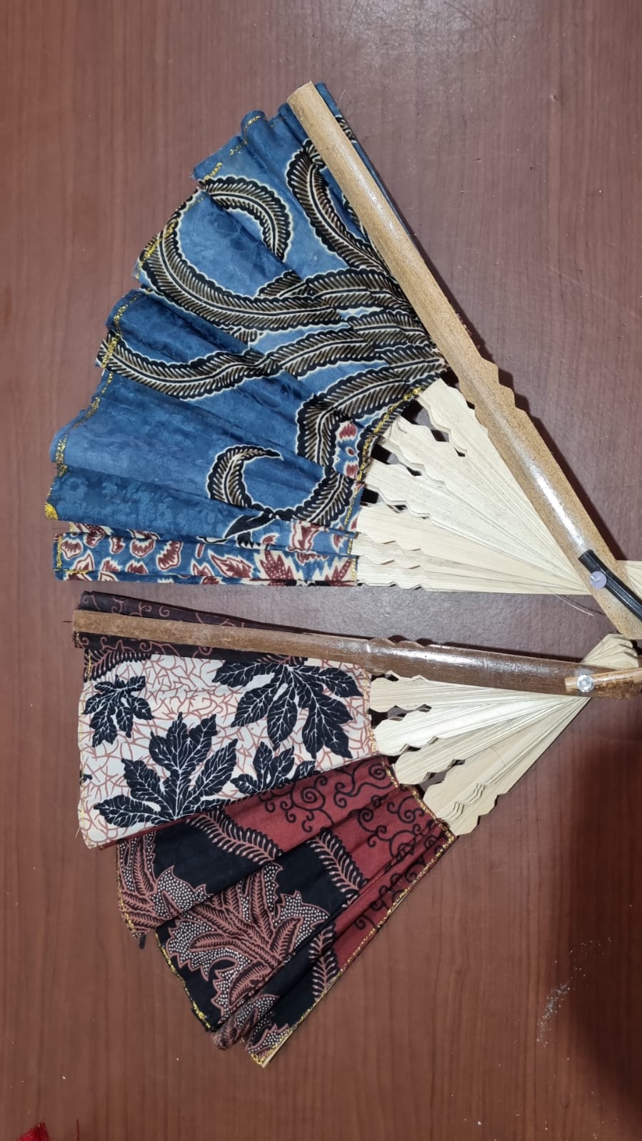 30 cm handmade batik cotton fan with natural bamboo handle, ideal for summer use, décor, and event souvenirs.