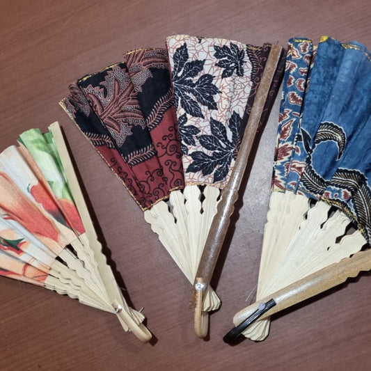 30 cm handmade batik cotton fan with natural bamboo handle, ideal for summer use, décor, and event souvenirs.