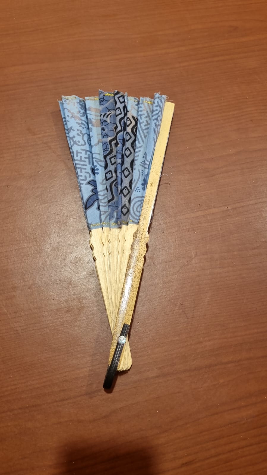 30 cm handmade batik cotton fan with natural bamboo handle, ideal for summer use, décor, and event souvenirs.