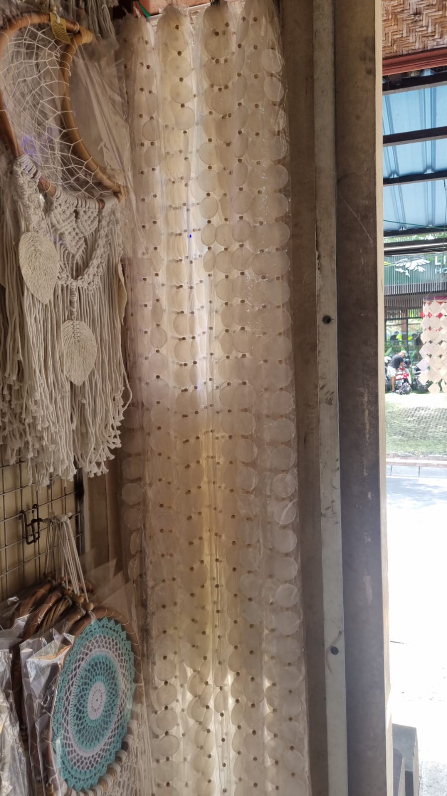 Handcrafted capiz shell curtain 200cm with wood bead accents — ideal for boho, tropical, or coastal room design.