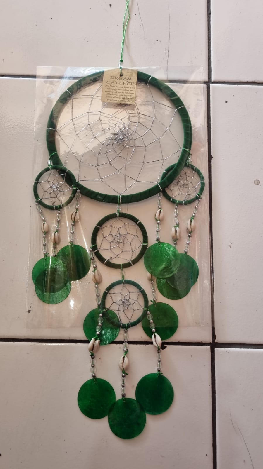 Colorful handmade dreamcatcher 16cm with nylon web, capiz shell discs, cowrie shells, boho wall hanging.