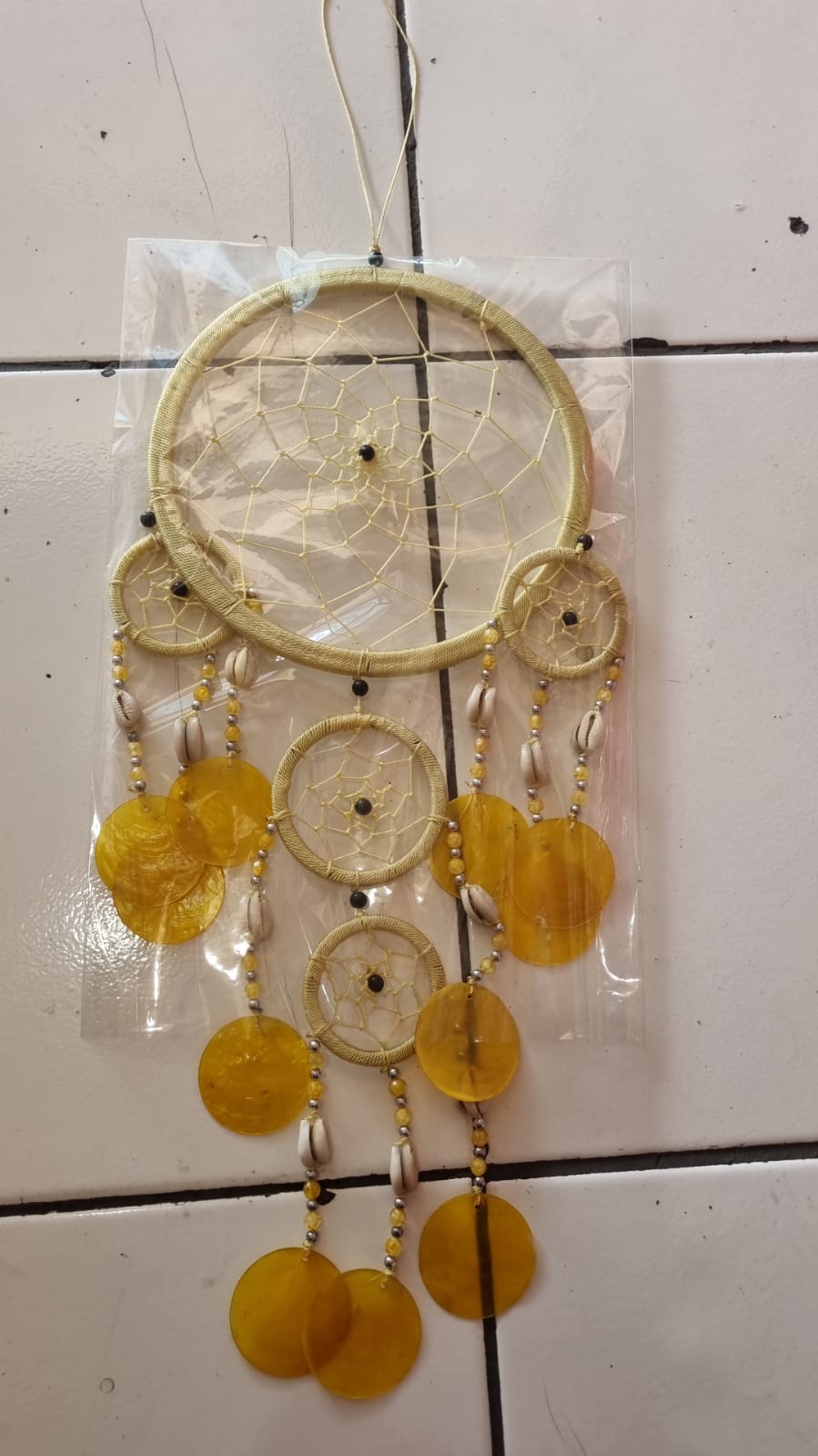 Colorful handmade dreamcatcher 16cm with nylon web, capiz shell discs, cowrie shells, boho wall hanging.