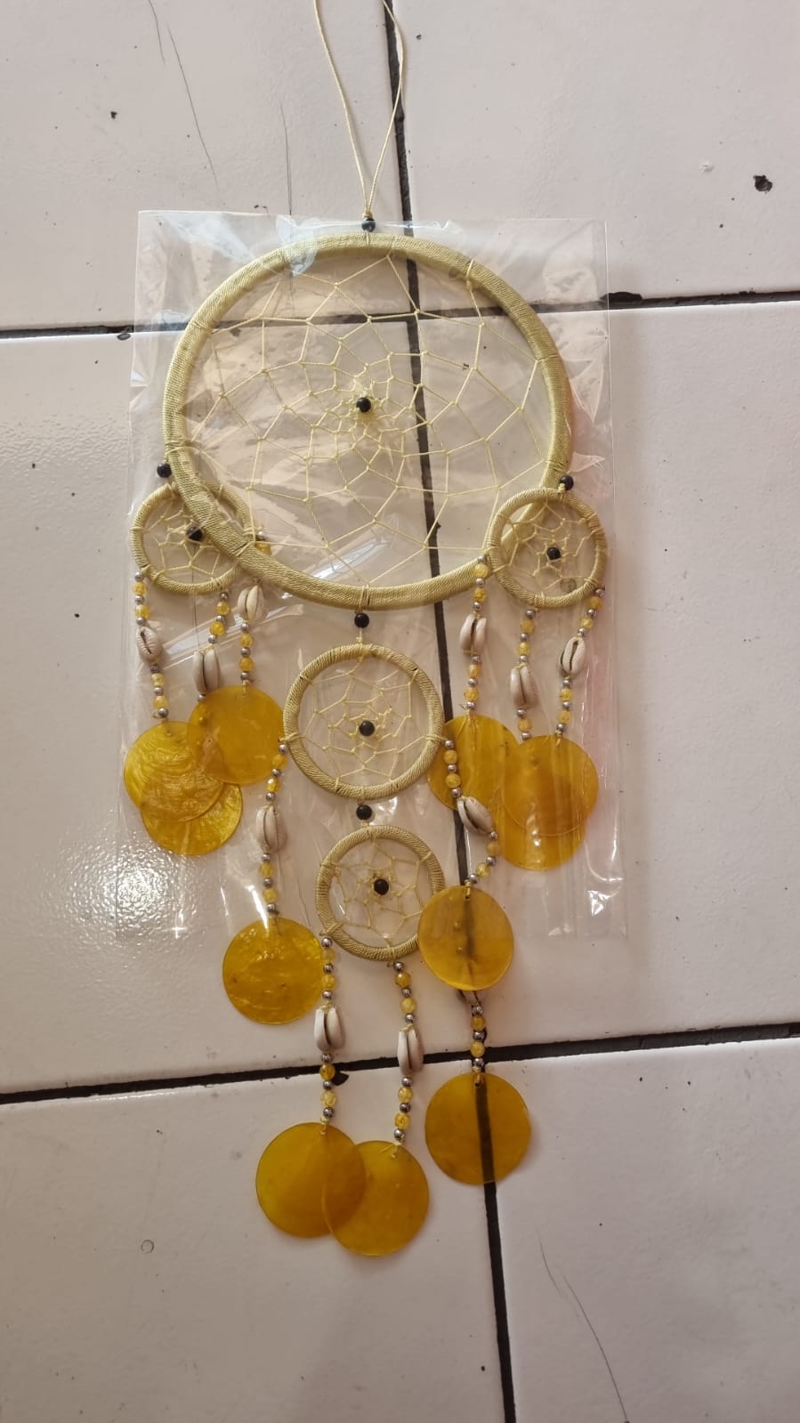 Colorful handmade dreamcatcher 16cm with nylon web, capiz shell discs, cowrie shells, boho wall hanging.