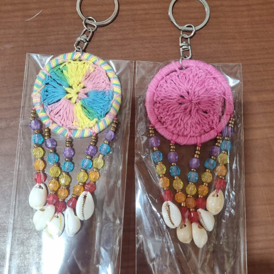 Mini dreamcatcher keychain handmade with cotton crochet, colorful beads, and shells