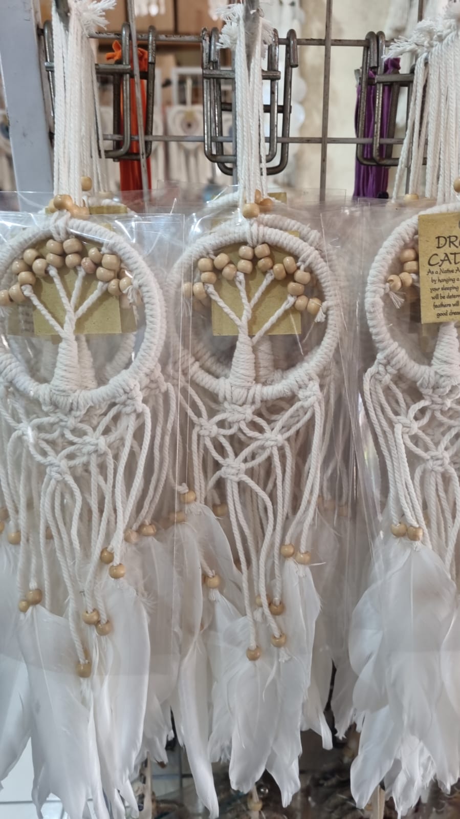 Mini handmade Tree of Life dreamcatcher with cotton cord, wooden beads, and white feathers – 7 cm (2.75 inch) wall hanging decor.