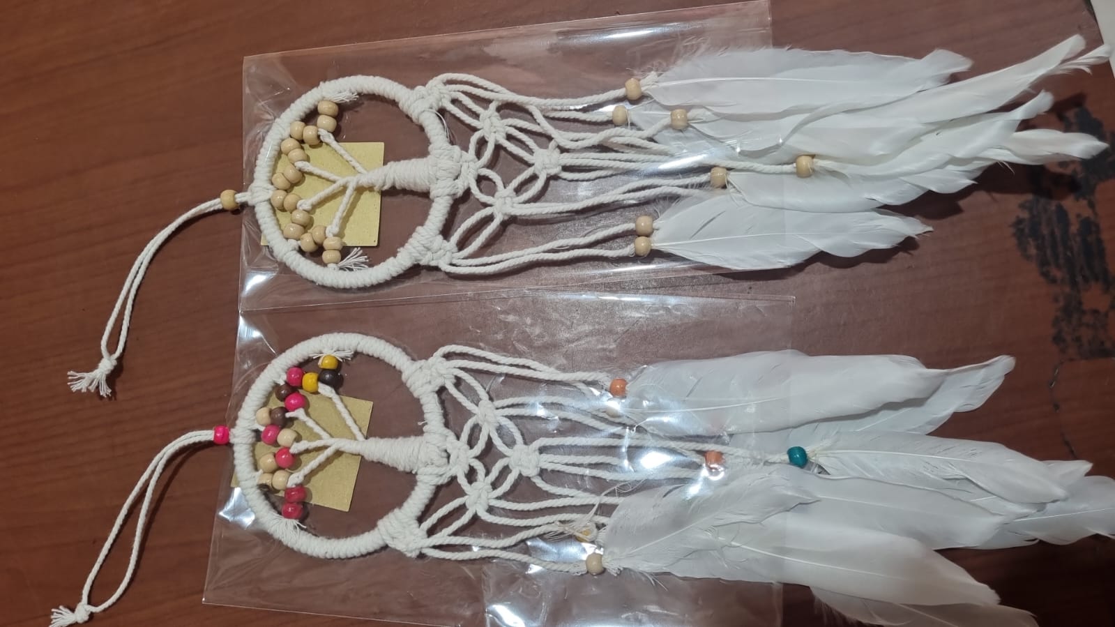 Mini handmade Tree of Life dreamcatcher with cotton cord, wooden beads, and white feathers – 7 cm (2.75 inch) wall hanging decor.