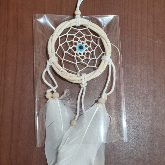 Small handmade rattan dreamcatcher 6 cm with white feathers, ideal for boho home or car decoration.