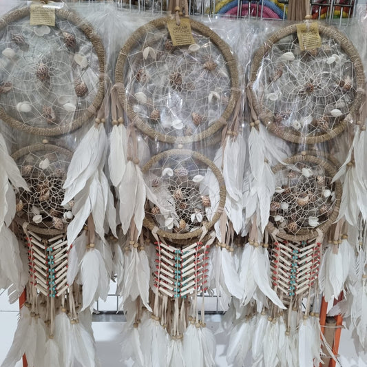 Double hoop dreamcatcher with agel fiber, white feathers, bone beads, and natural shells – perfect for boho decor