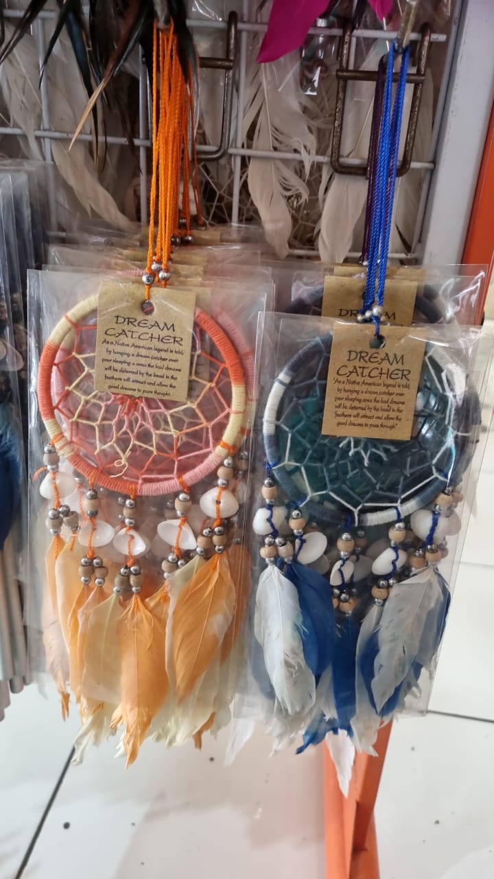 10cm handmade dreamcatchers with colorful feathers and cowrie shells in clear packaging, perfect for boho decor or gift