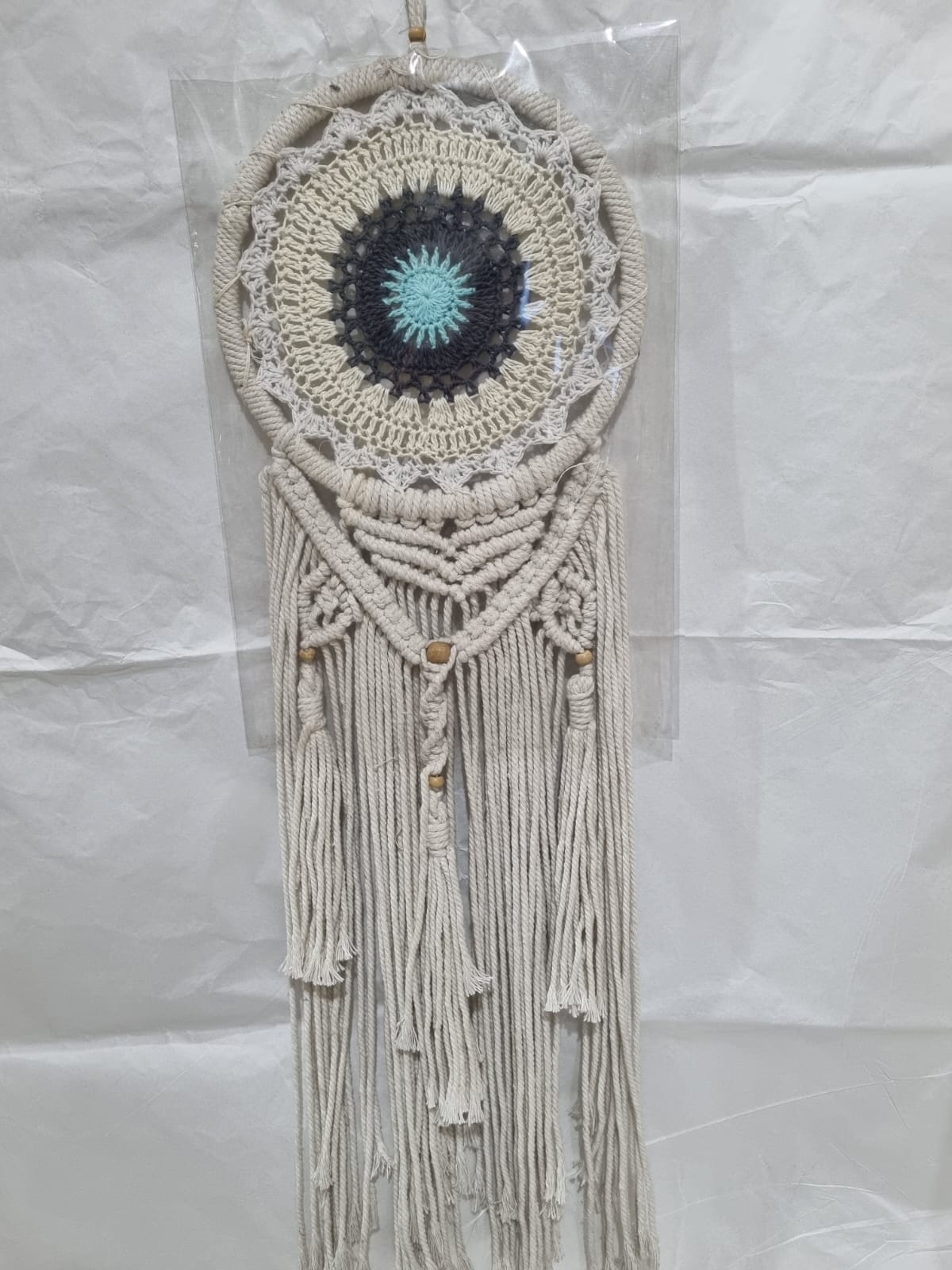 Crochet and macrame cotton dreamcatcher with evil eye motif and hanging tassels, 22cm diameter, handmade spiritual decor

