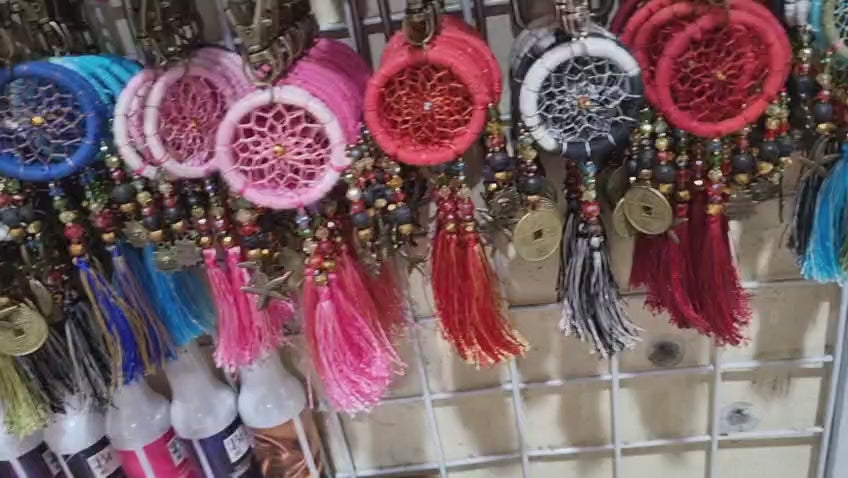 Handcrafted crystal dreamcatcher keychain with colorful tassels and beads