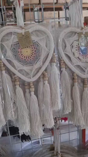Macrame heart-shaped dreamcatcher with soft cotton tassels, wooden beads, and colorful crochet center