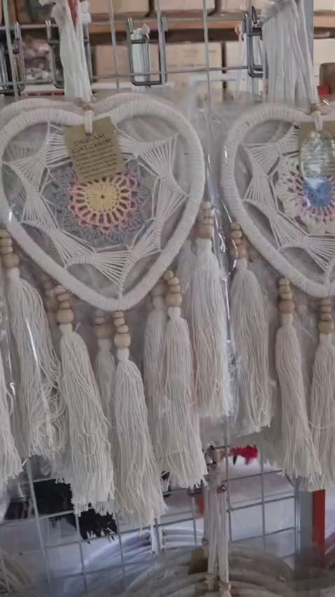 Macrame heart-shaped dreamcatcher with soft cotton tassels, wooden beads, and colorful crochet center
