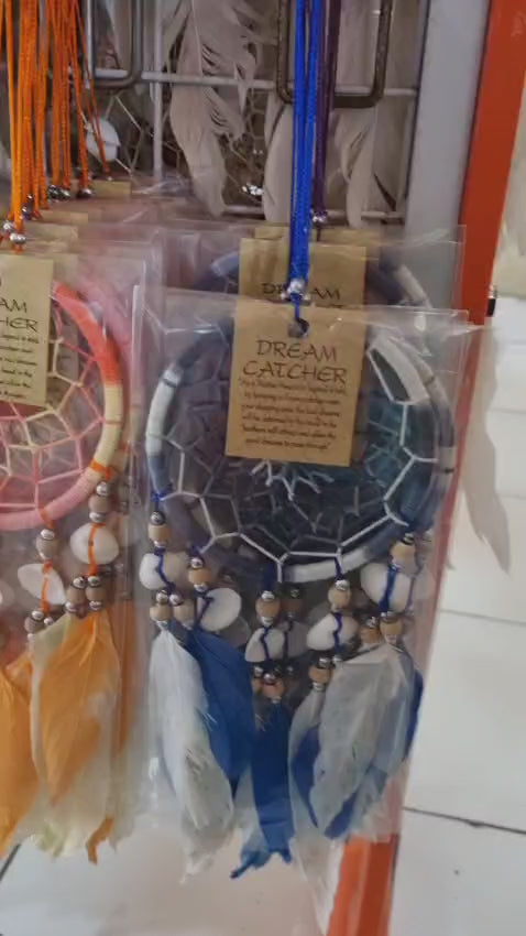 10cm handmade dreamcatchers with colorful feathers and cowrie shells in clear packaging, perfect for boho decor or gift