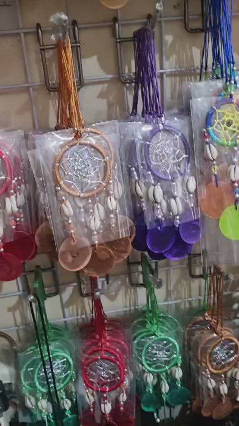 Colorful mini dreamcatcher keychain with natural shells and nylon webbing — perfect for car or wall hanging