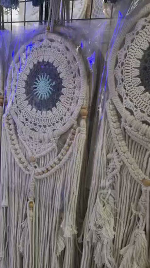 Crochet and macrame cotton dreamcatcher with evil eye motif and hanging tassels, 22cm diameter, handmade spiritual decor


