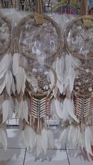 Double hoop dreamcatcher with agel fiber, white feathers, bone beads, and natural shells – perfect for boho decor
