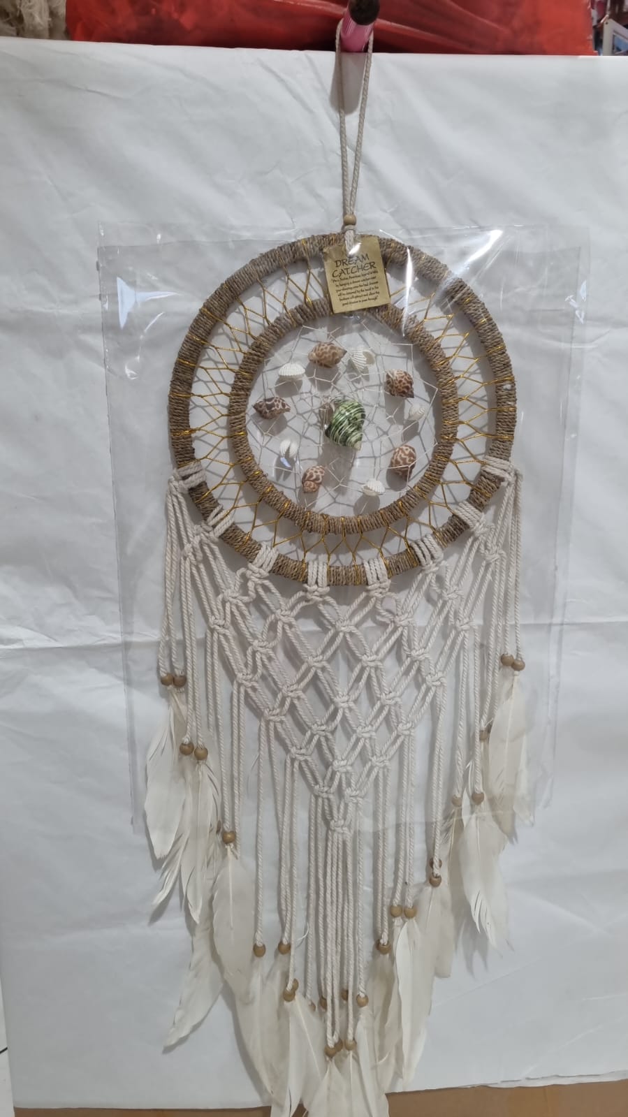 Large boho dreamcatcher with agel wrapped hoop, macrame knots, white feathers, and sea shell decor – 25cm handmade coastal wall hanging

