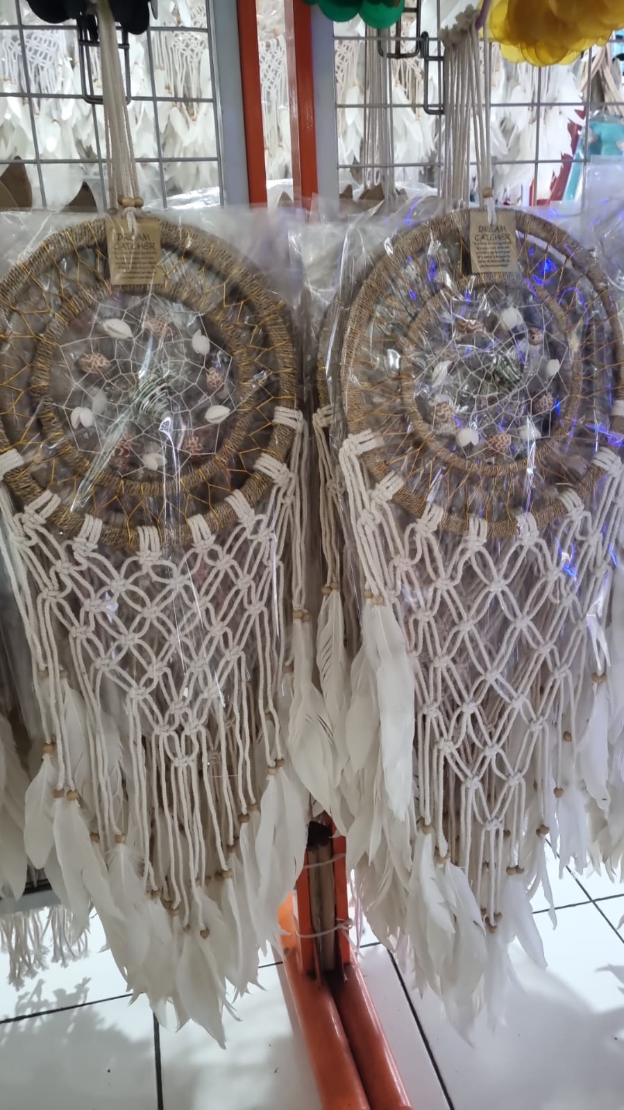 Large boho dreamcatcher with agel wrapped hoop, macrame knots, white feathers, and sea shell decor – 25cm handmade coastal wall hanging

